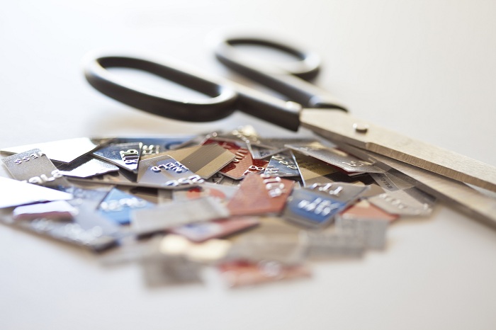 Cutting credit cards for personal loans